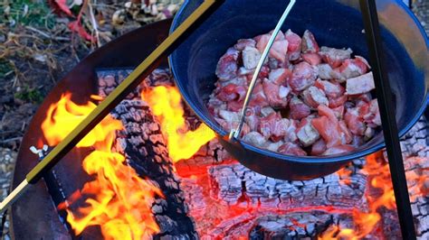 Meat On The Firecooking Meat In A Cauldronwood Fire And Cauldron With