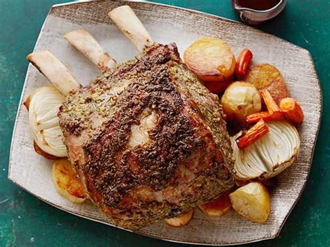 After 15 to 30 minutes, place vegetables on rack around roast; Standing Rib Roast with Cabernet au Jus Recipe