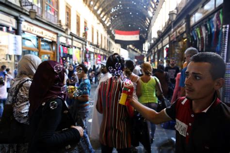 At A Damascus Market Divided Syria Comes Together Again