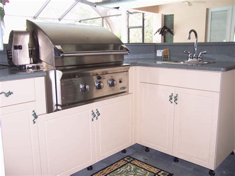 Out door cabinet also come in with a brilliant locking system to ensure the products stored explore the varied. Whimsical Frogs on Outdoor Kitchen Cabinets - Werever ...