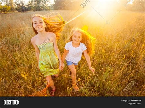 two beautiful sisters image and photo free trial bigstock