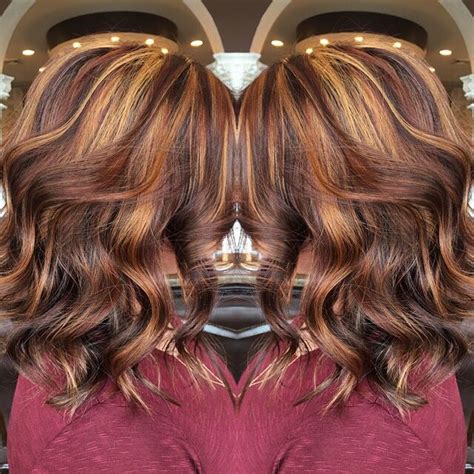 Blonde and auburn highlights on brown hair can create a mixture of delicious shades. Violet base with auburn lowlights and golden highlights ...