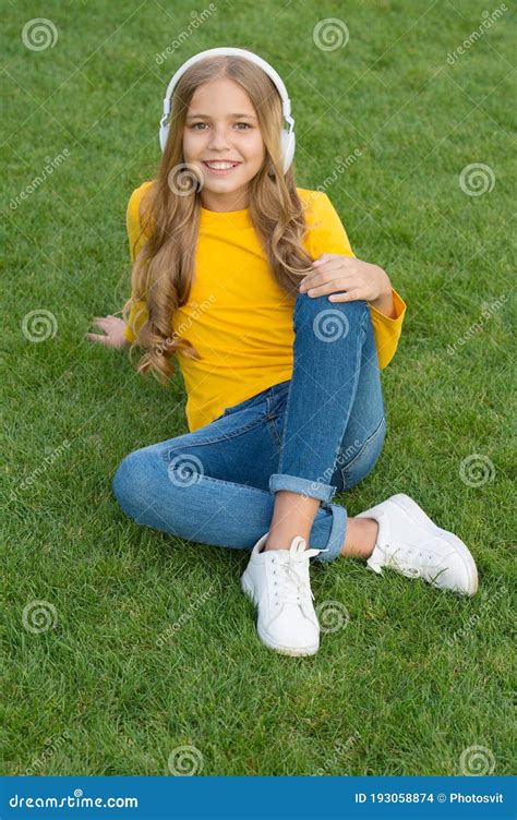 Cute Smiling Girl Modern Headphones Enjoy Music Relaxing Outdoors