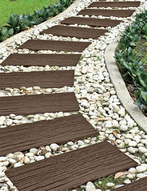 30 Newest Stepping Stone Pathway Ideas For Your Garden Sloped Garden Front Yard Landscaping