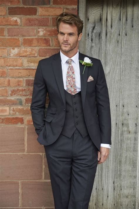For men the black cutaway morning suit black traditional cutaway suit exclusively presented by formal wear of melbourne from ike behar. Wedding Suit Hire, Mens Suit Hire, Formal Suit Hire, South ...