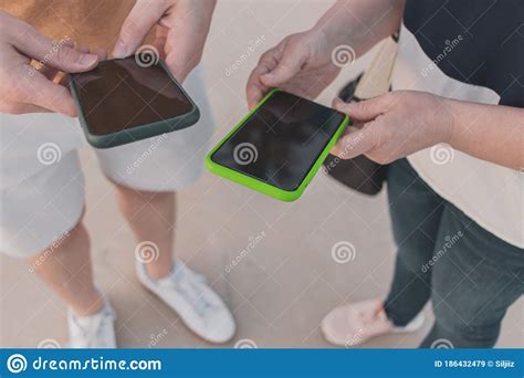 Two Friends With Their Smart Phones Technology Stock Image Image Of