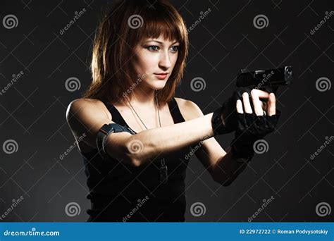 Woman Holding Gun Stock Photography Image 22972722