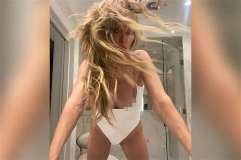 Heidi Klums Wardrobe Malfunction As She Poses In A Low Cut Bodysuit