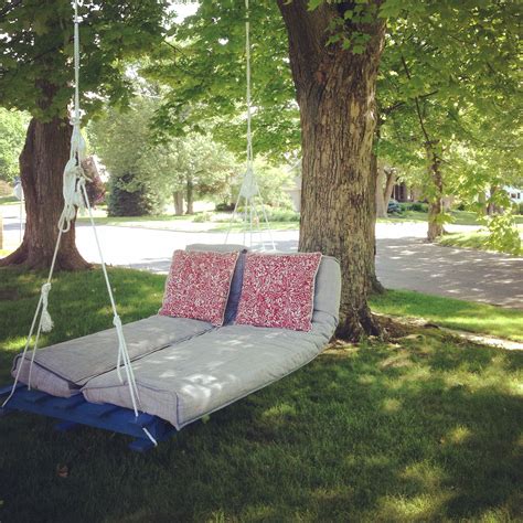 Alternative mounting making an indoor children's swing chair a nice garden swing for the parents. Pallet swing with adjustable, moveable knots and anchors. IKEA futon mattress. Total cost: $200 ...