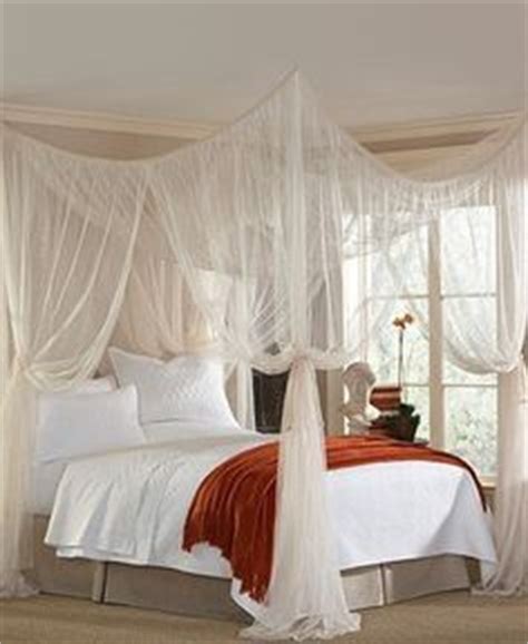 These easily screwed in and kept the rod secure and safe from falling. Canopy Bed, sheers hanging from ceiling | Romance | Pinterest
