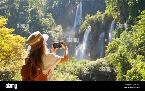 Young Woman Traveler Make Photos For Social Media Of Amazing Exotic