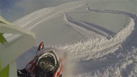 Backcountry Snowmobiling Mountain Sled Riding Snowmobile In Deep Powder