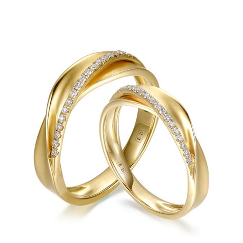 Their wedding poem read two wills, two hearts, two passions are bonded in one marriage by a diamond by the 17th century diamonds were showing up more often in wedding and engagement rings. Elegant Curled Ribbon Diamond Matching Wedding Rings | England Diamond Co.