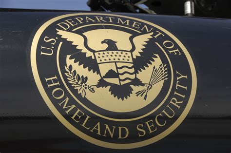The Us Department Of Homeland Security Logo Adorns A Black Hawk