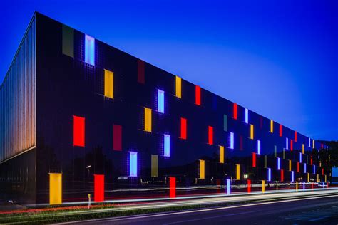Colored Bipv Facade With Led Glass Elements Of Omicron In Austria Made By Sunovation Facade