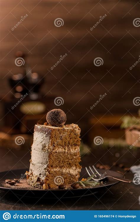Slice Of Delicious Naked Coffee And Hazelnuts Cake Stock Photo Image