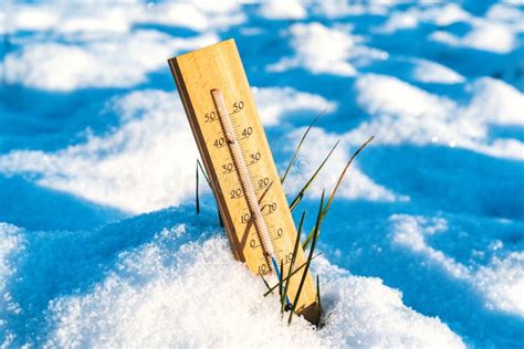 Thermometer In The Snow In Winter Showing A Negative Temperature Stock
