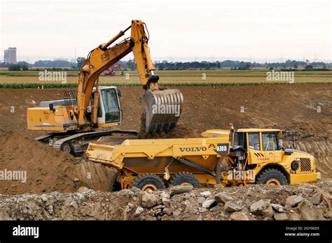 Shovel Excavator And Truck On A Building Site Austria Stock Photo Alamy