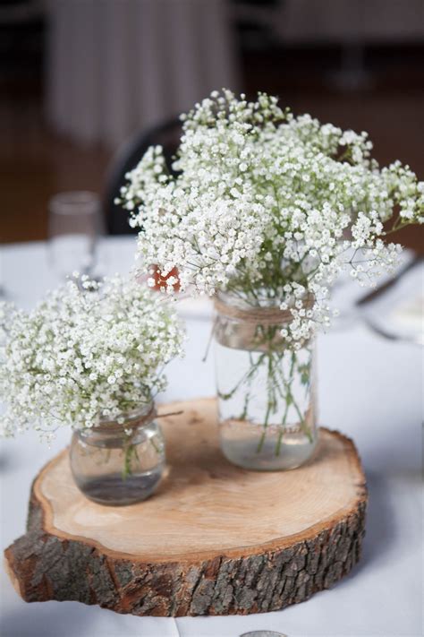 Rustic Mason Jar Babys Breath And Wood Centerpieces Wood