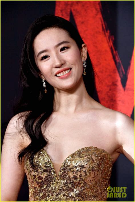 yifei liu the star of disney s mulan remake looks stunning at the l a premiere photo