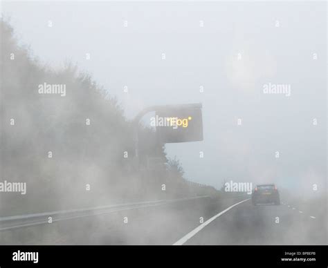 Fog Foggy Weather Driving Motorway Road Sign Hi Res Stock Photography