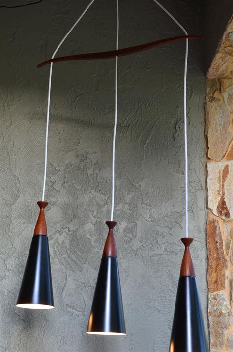 Triple canopy is a magazine that publishes digital works of art and literature, books, and software, among other media and experiences. Superb 60's MCM Teak Triple Black Cone Pendant Fixture ...