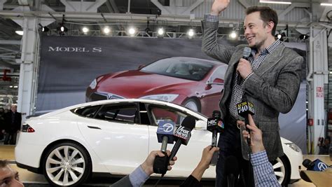 Tesla CEO Elon Musk: Cars all go self-driving in 20 years