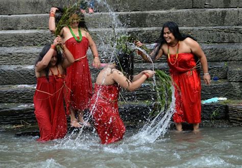 Nepalese Hindu Women Take A Ritual Bath In The Bagmati River During The Rishi Panchami Festival