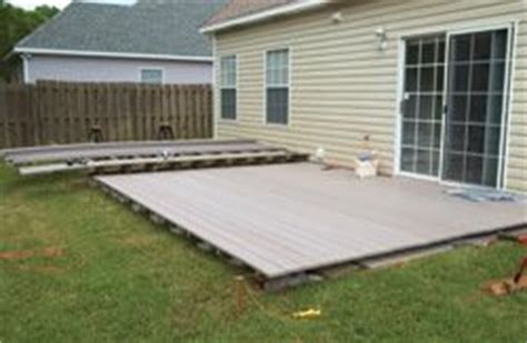 Precast blocks available at home improvement centers are usually 12 inches square and 8 to 12 inches high. LowDeckTT15 DIY Steps for Building a Deck Over a Patio ...