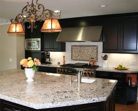If you opt for black or dark brown cabinets, the countertop will appear a bit grey, which could take away from the boldness of the granite, so go with blue or a light color. Dark Cabinets & Bianco Antico Granite | Home | Pinterest ...