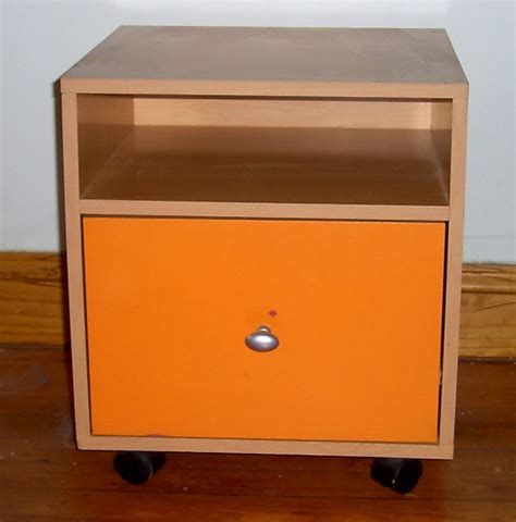 Vintage file cabinet with teak wood grain on casters. small cabinet on wheels with drawer | Flickr - Photo Sharing!