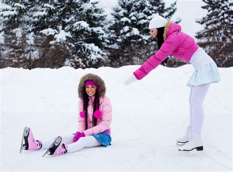 Two Girls Ice Skating Stock Photo By ©lanakhvorostova 1809530