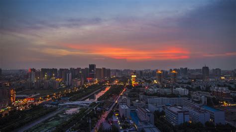 Free Download Hd Wallpaper Zhengzhou Lights Sunset City At Dusk