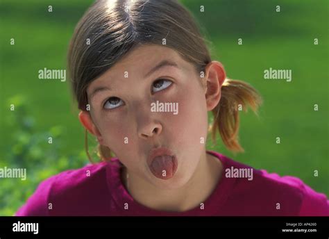 Girl Sticking Tongue Out Stock Photo 1458783 Alamy