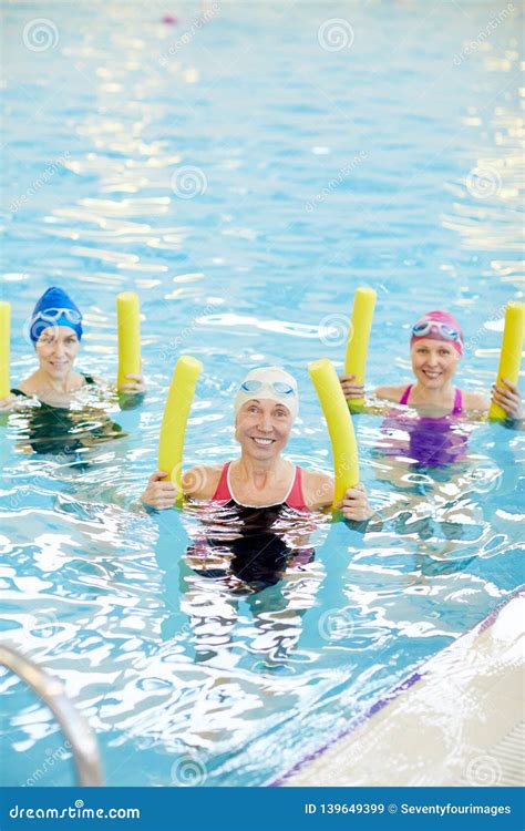 Group Of Women Working Out In Water Stock Image Image Of Noodle