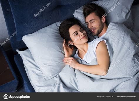 Romantic Couple Lying Bed Room — Stock Photo © AllaSerebrina #188910326