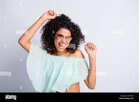 Photo Portrait Of Funky Mulatto Girl With Curly Hair Wearing Sunglass Dancing At Party Isolated