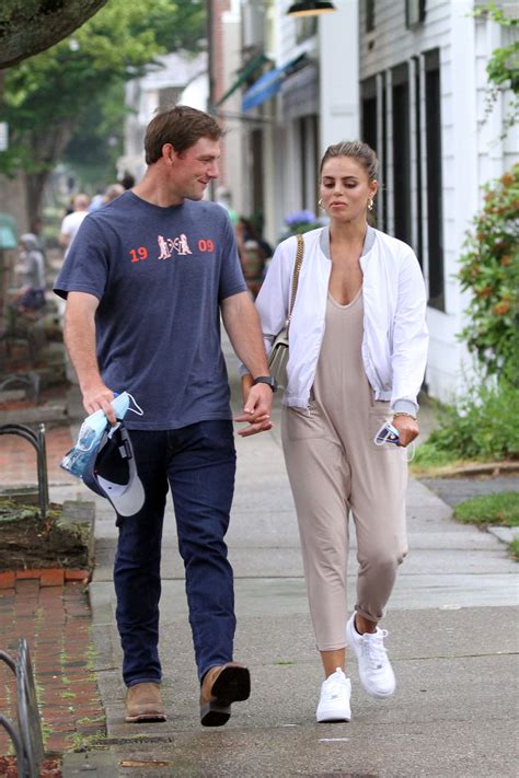 Brooks Nader and her husband William are phtographed walking in the Hamptons New York 