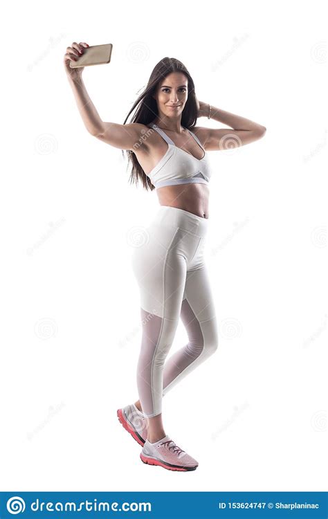 Happy Successful Fitness Model Woman Taking Selfie With Smartphone Looking At Camera Stock