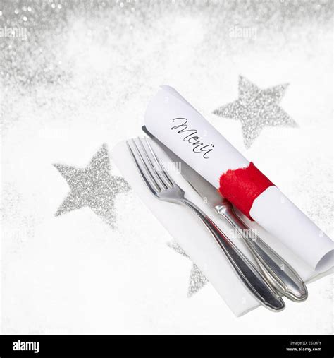 Decoration Of Christmas Tableware Fork And Knife On A White