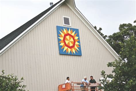 Check out this free barn raising quilt pattern download. Woodshop gets quilt of honor - My Sunday News