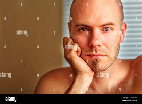 Portrait Of Man Resting His Head In His Hand Stock Photo Alamy