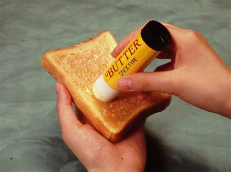 Butter is a soft yellow substance made from cream. butter-stick - Fubiz Media