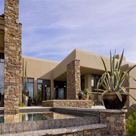 Stone Detail Backyard Patio Infinity Pool Dramatic Southwest