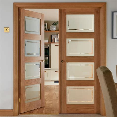 We offer internal doors in three finishes. Shaker Four Panel Oak Glazed Internal Door | Howdens