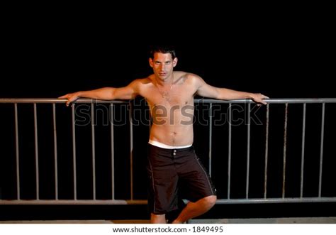 Shirtless Man Leaning Against Railing Night Stock Photo Shutterstock