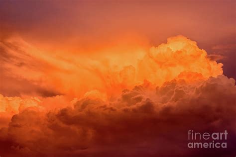 Awesome Sunset Red Orange Cumulus Clouds Are Towering In This Dramatic
