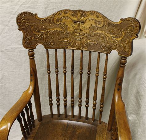 Antique carved mahogany north wind face curule throne chair. Bargain John's Antiques | Armed Office Chair with Old Man ...