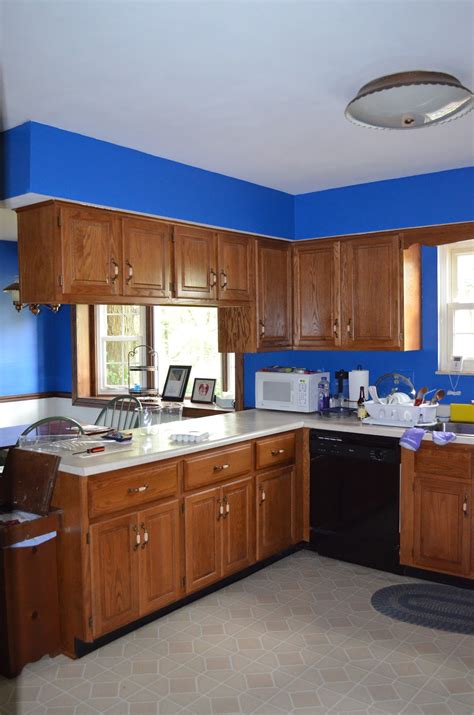 Use a cordless drill to unscrew all the doors from the cabinets. Crazy Little Thing Called Life: How to Paint a Cabinet