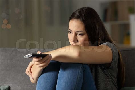 Depressed Woman Watching Tv At Home Stock Image Colourbox